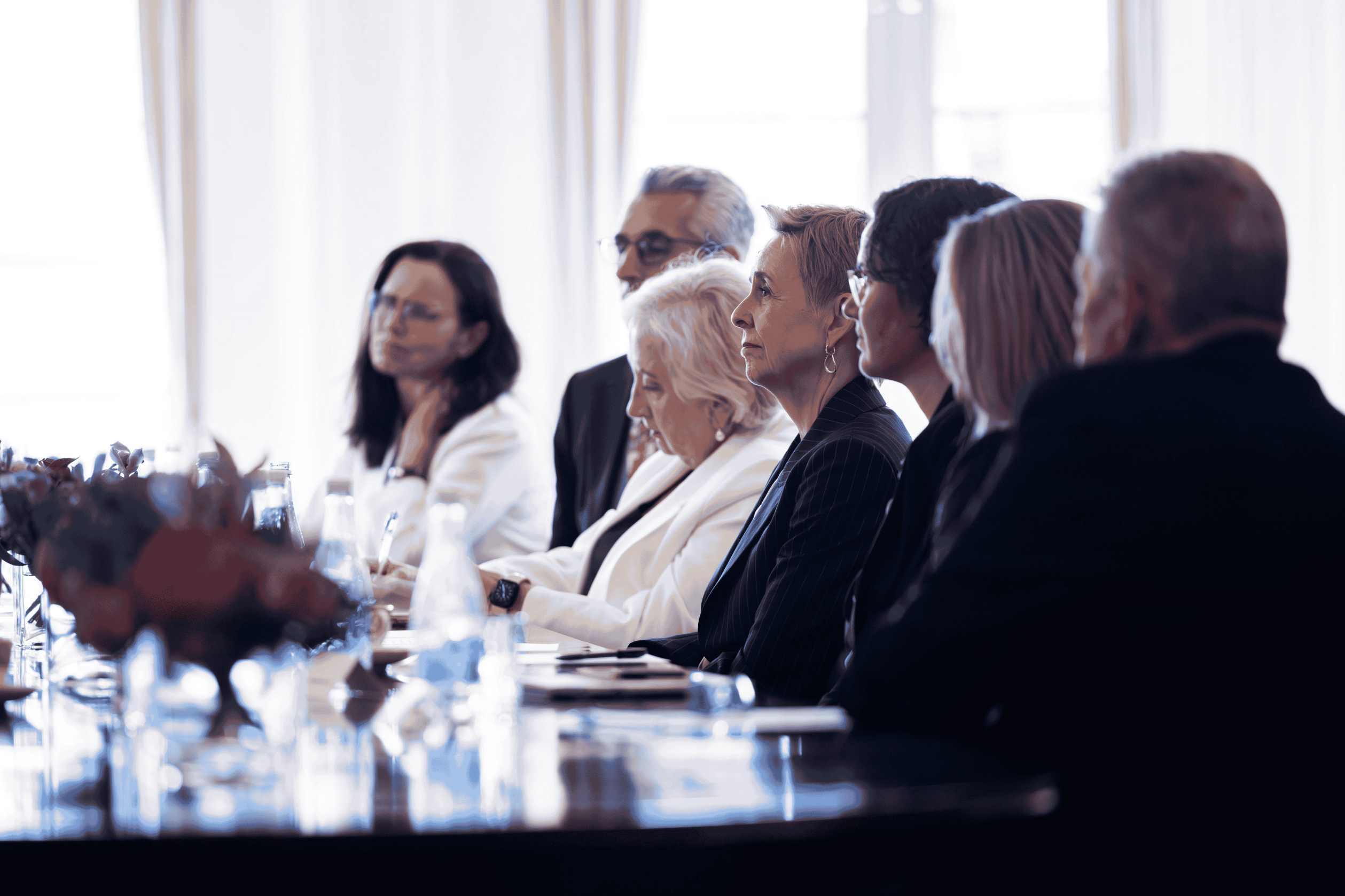 Commissioners and Ambassadors at a meeting table